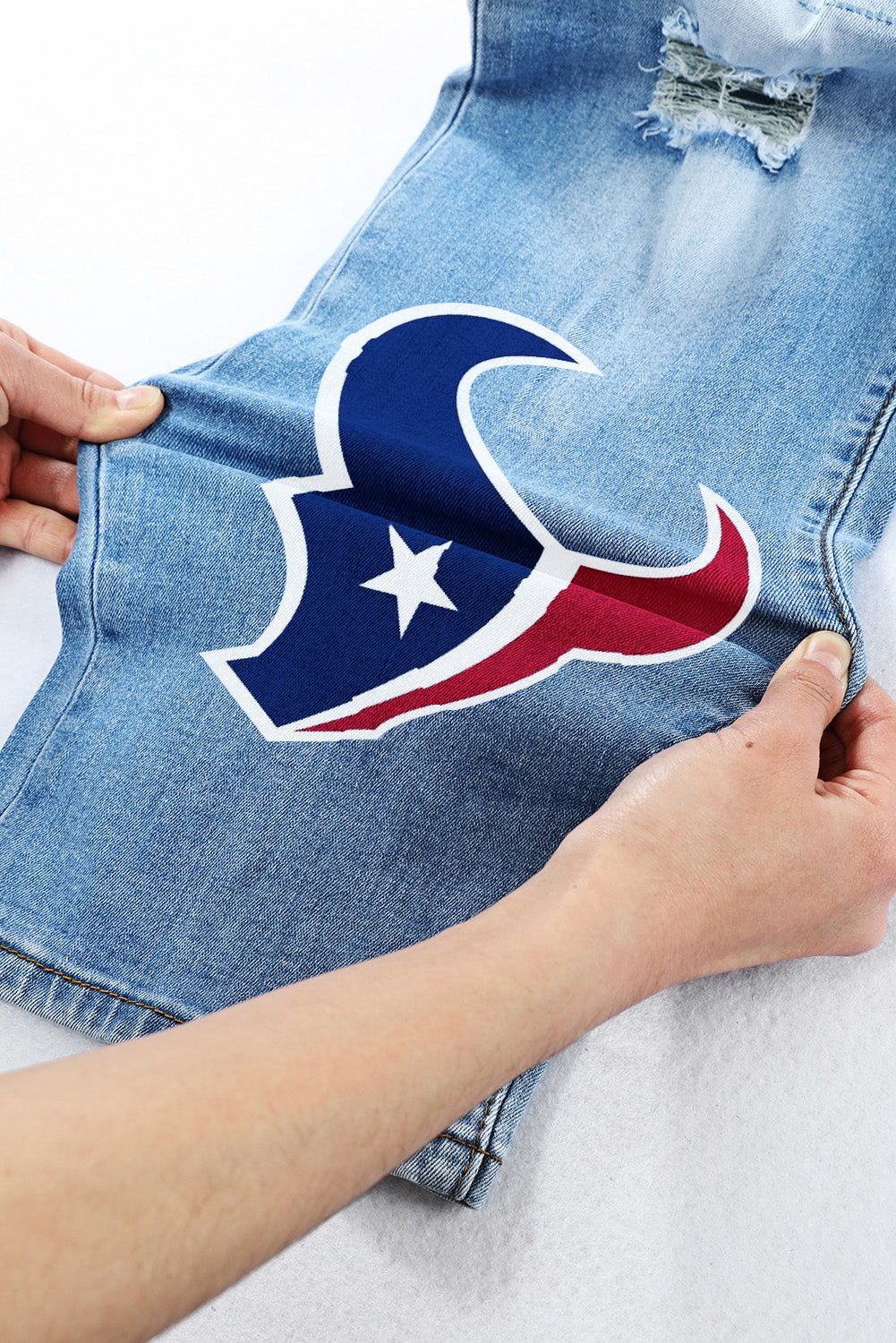 casual fashion perforated printed jeans