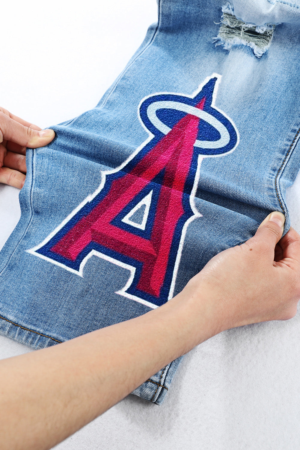 STRETCH RIPPED FRAYED RAW HEM DISTRESSED DENIM JEANS WITH HOLE