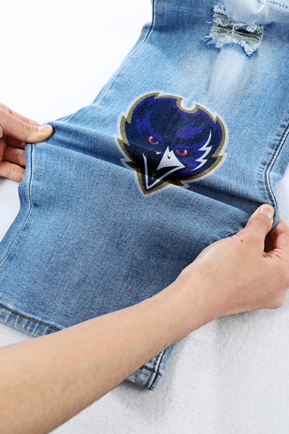 casual fashion perforated printed jeans