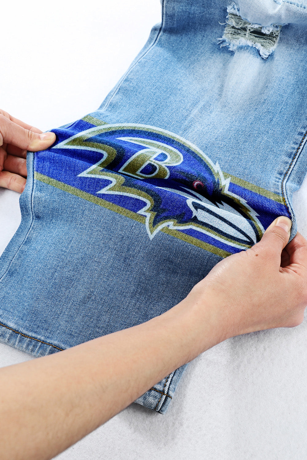 casual fashion perforated printed jeans