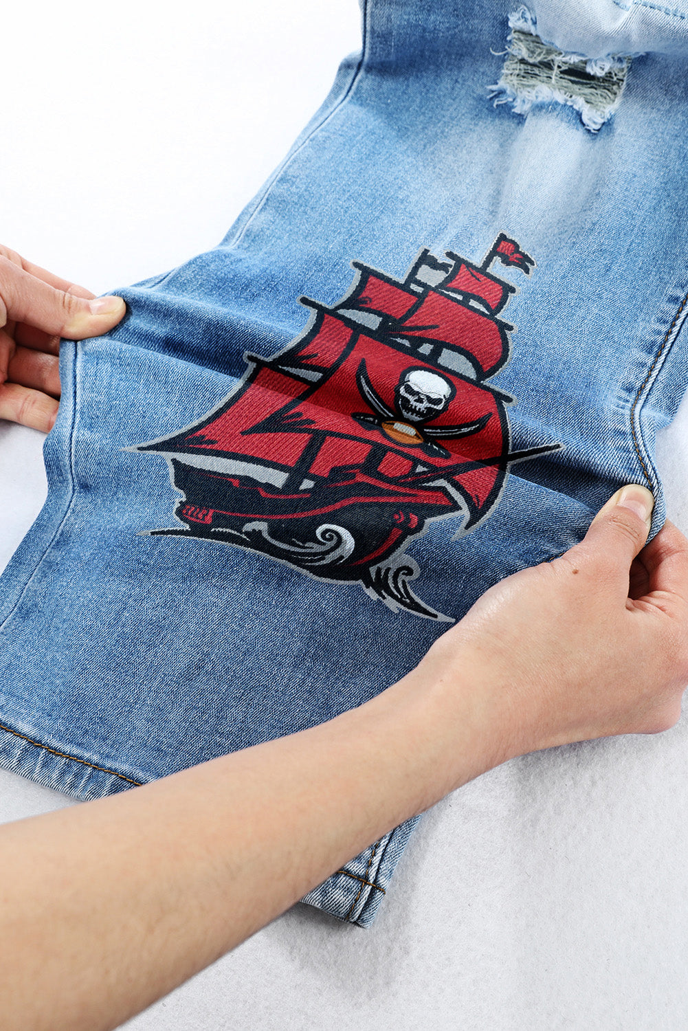 casual fashion perforated printed jeans