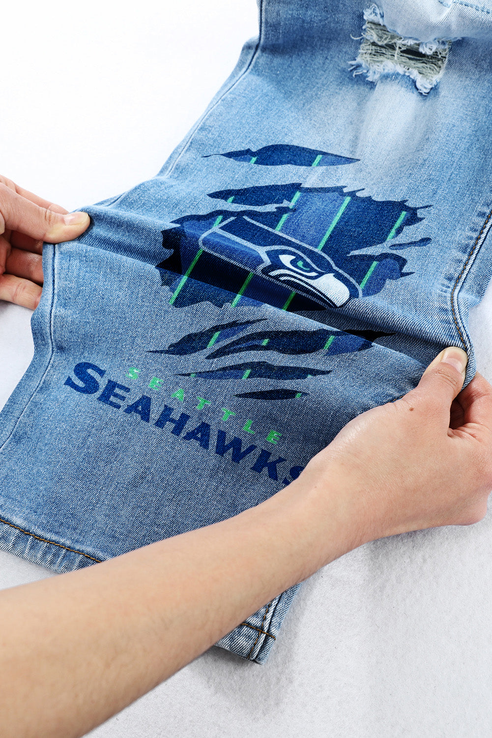 casual fashion perforated printed jeans