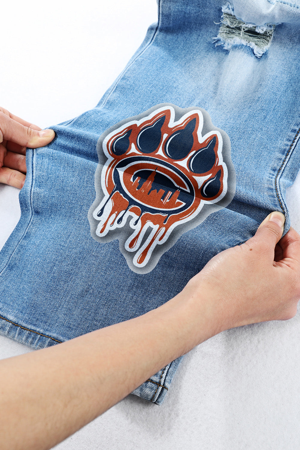 casual fashion perforated printed jeans