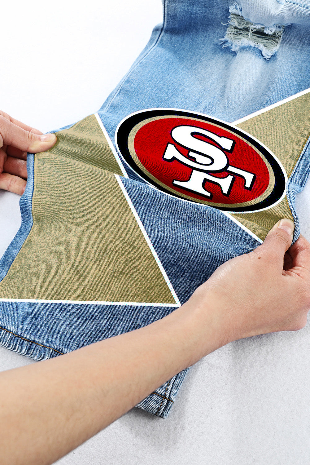 casual fashion perforated printed jeans