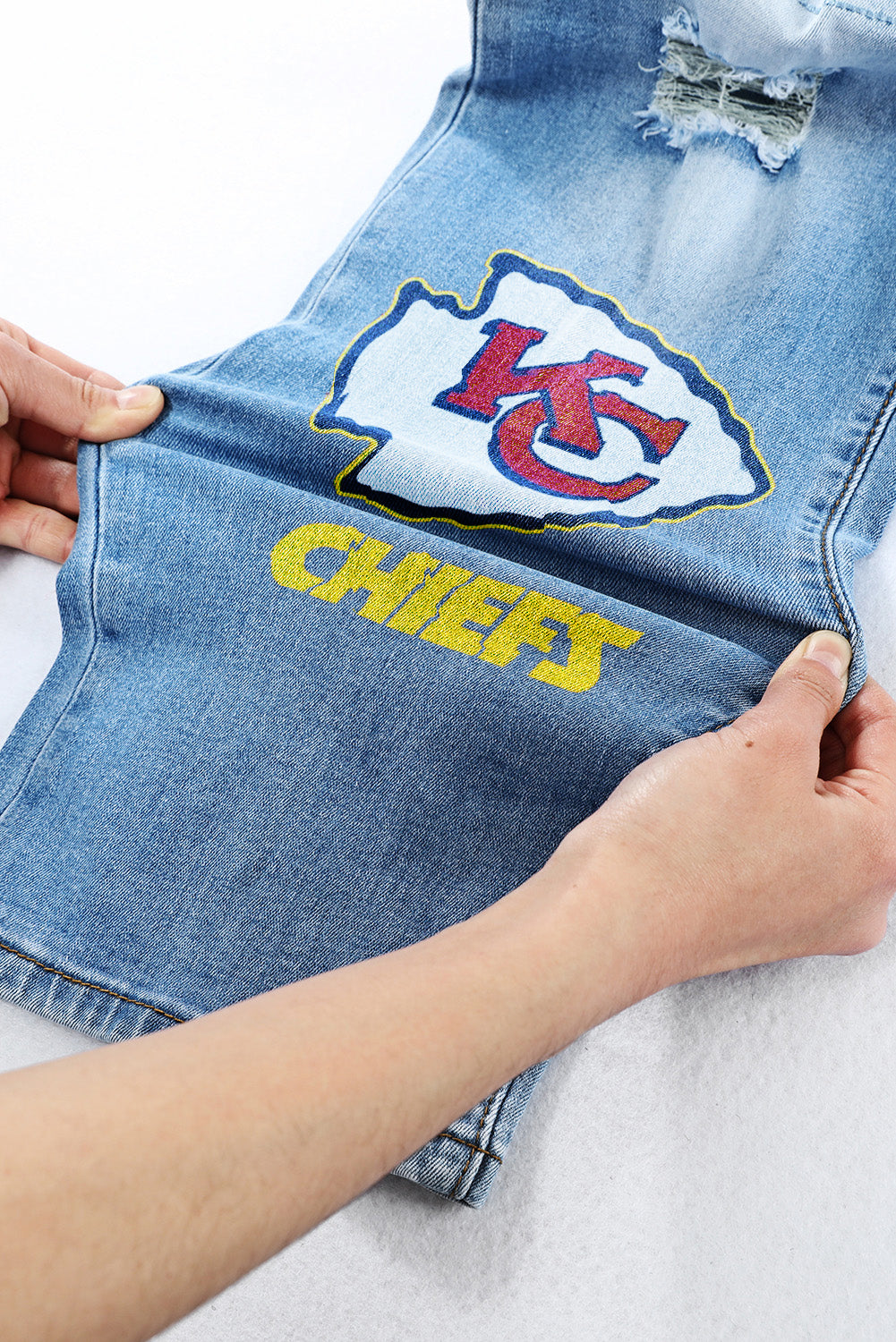 casual fashion perforated printed jeans