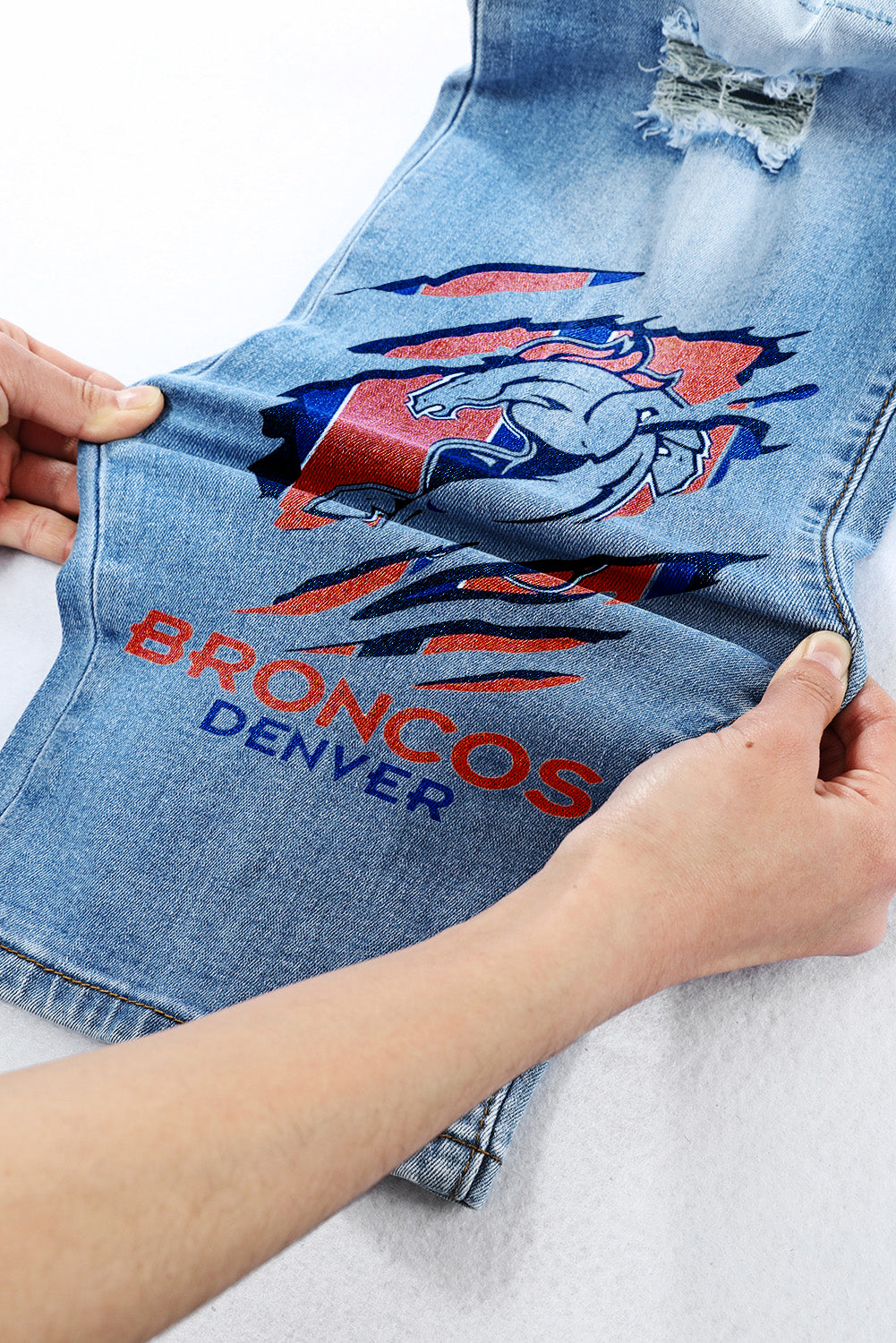 casual fashion perforated printed jeans